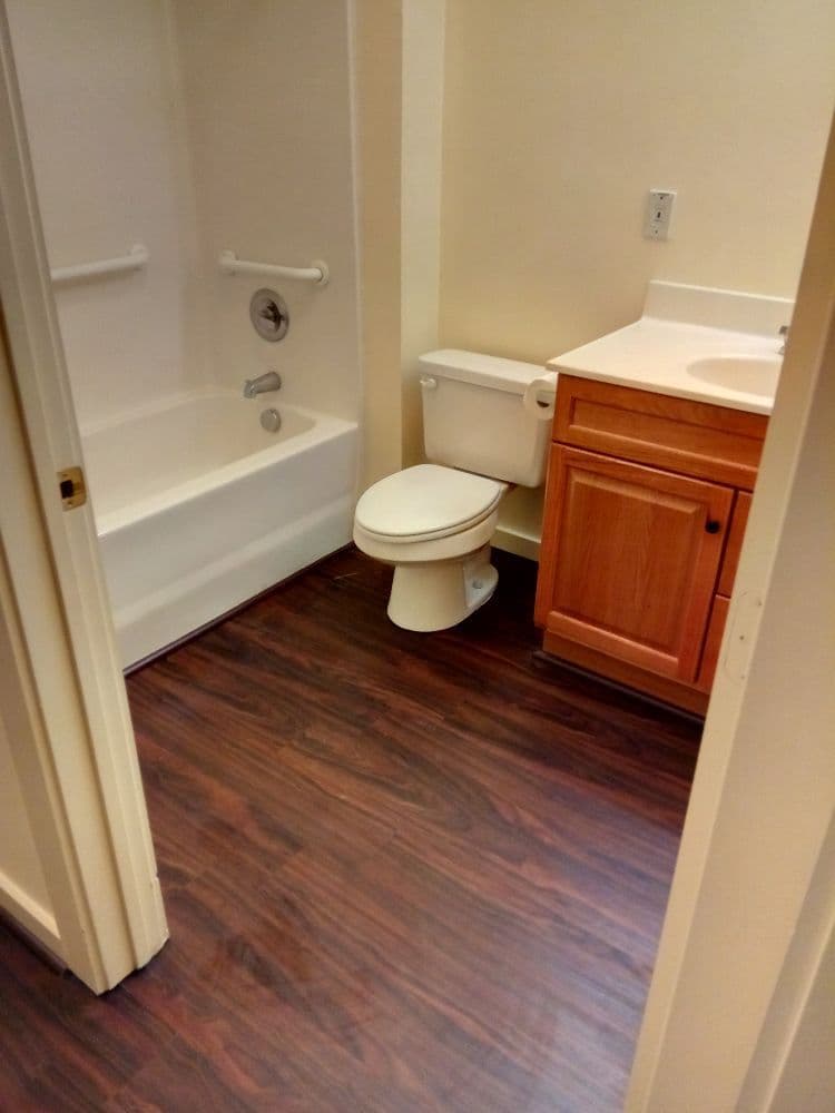 Laminate flooring installation in bathroom
